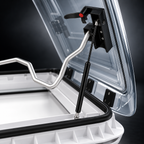 Close-up of the skylight latch, gas strut and silver operating bar.